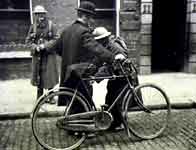 Image of British soldier searching cyclist